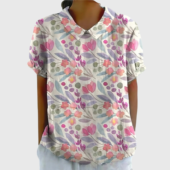 Women's summer blouse, a relaxed fit floral print top perfect for warm weather activities.