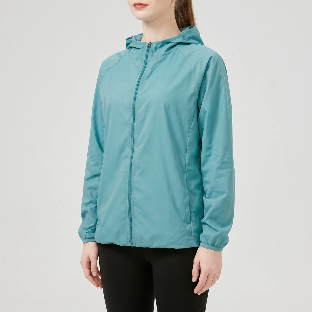 Versatile women's lightweight hooded jacket. A packable windbreaker, perfect for running, travel, & active outdoor wear.
