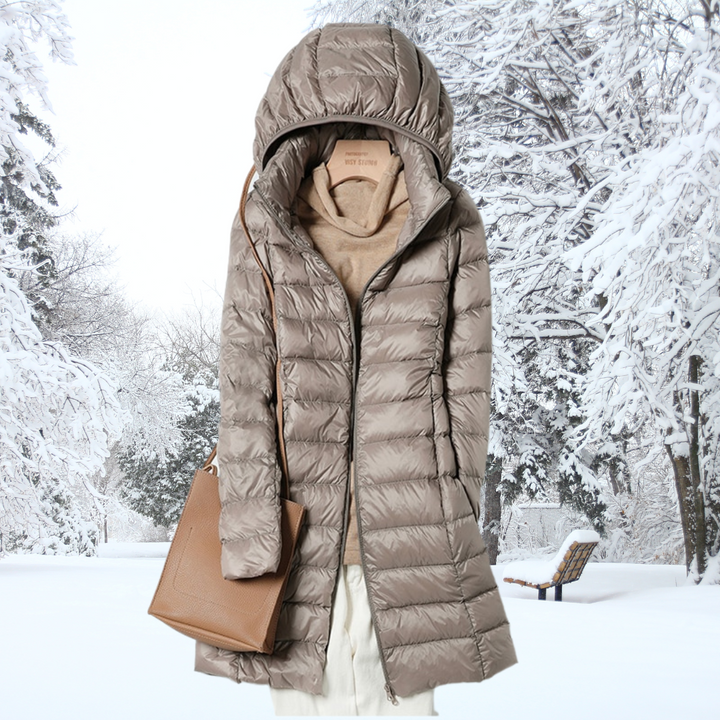 Packable ladies insulated jacket with a hood, ideal for travel & active outdoor activities.