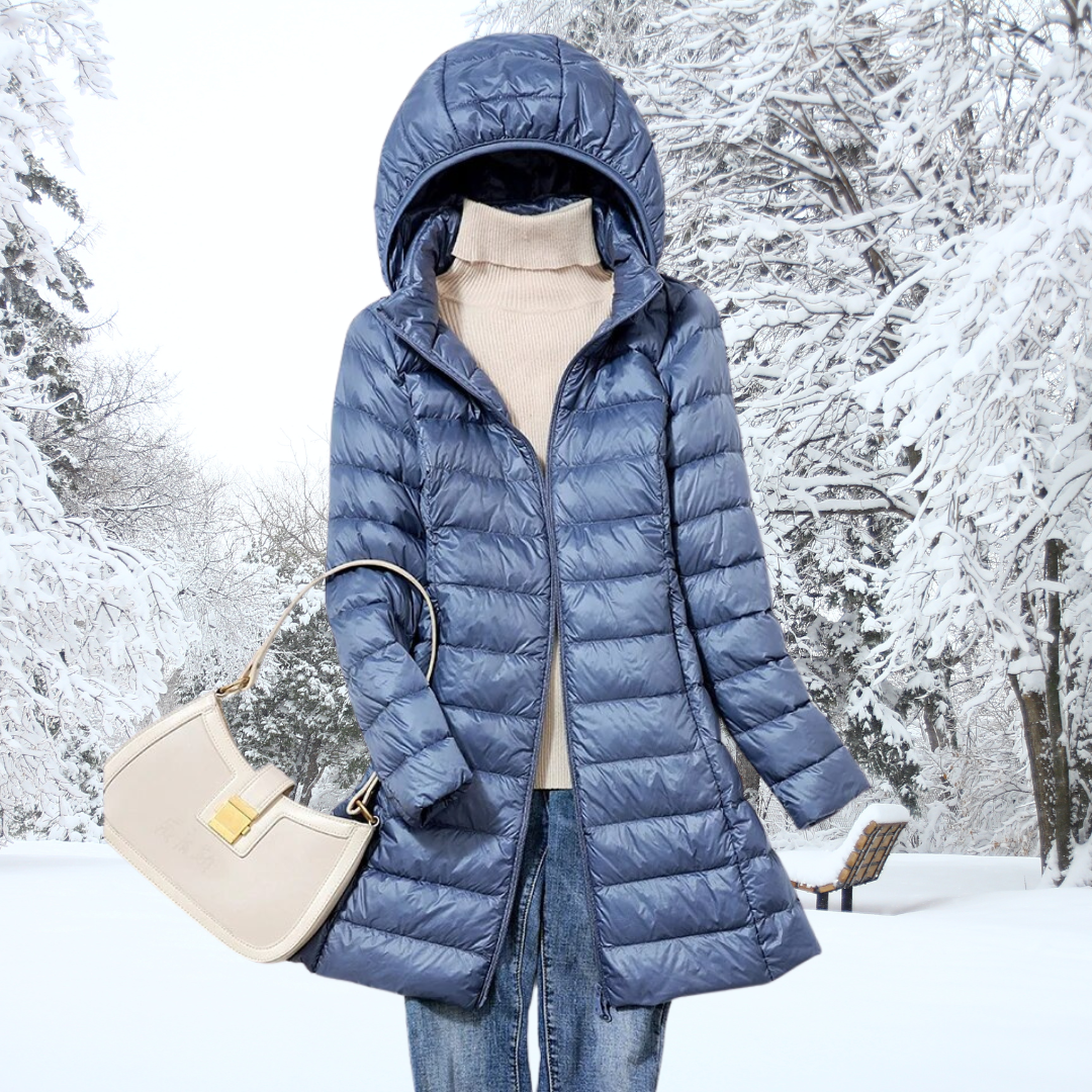 Warm women's fall jacket featuring a removable hood and full zipper closure for comfort.