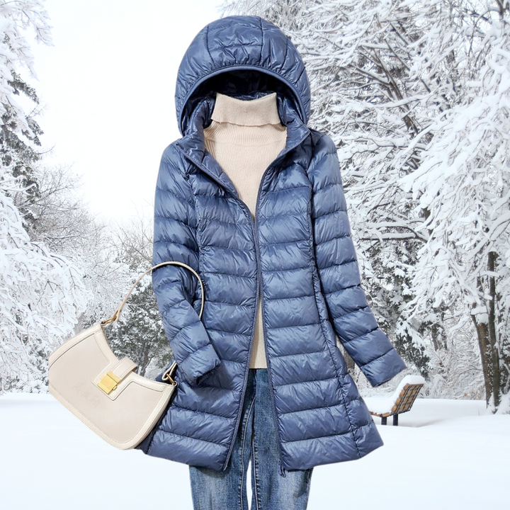Warm women's fall jacket featuring a removable hood and full zipper closure for comfort.