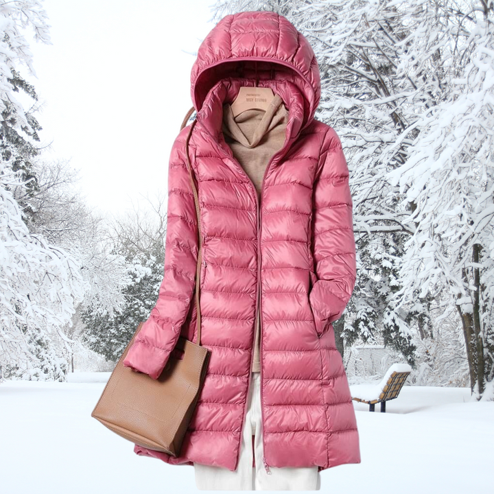 Grey women's hooded winter jacket, insulated & packable, excellent for layering & warmth.