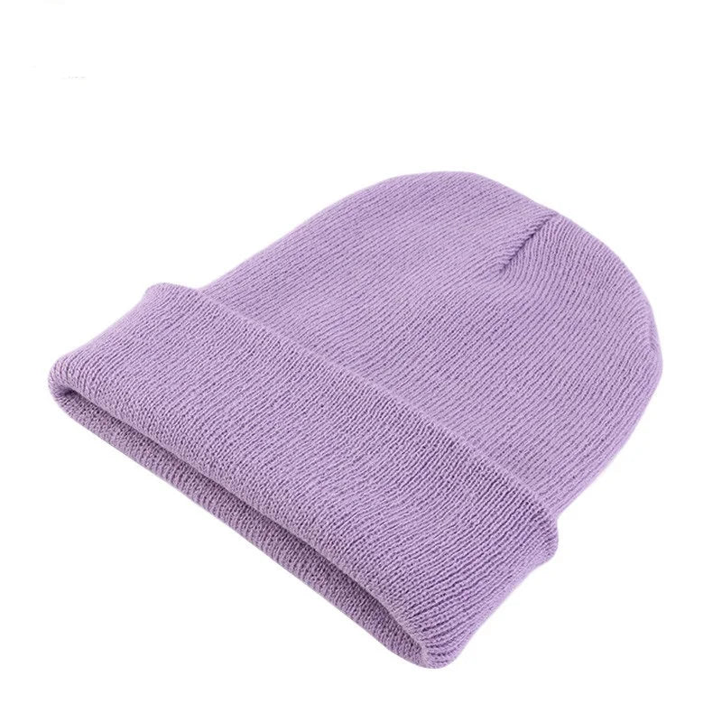 Women's lightweight knit beanie, essential soft acrylic casual accessory.