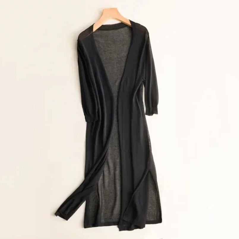 Long sleeve, open front women's cardigan. Lightweight, relaxed fit, perfect for elegant and casual layering.