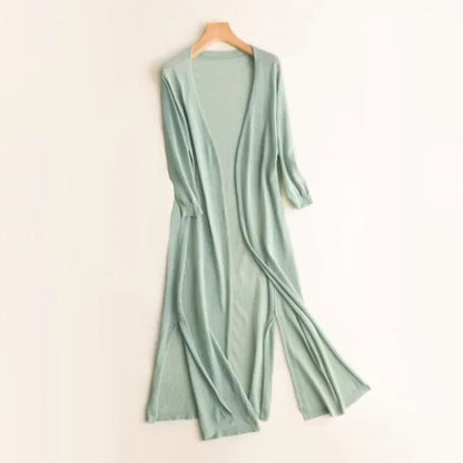 Graceful women's long cardigan, lightweight & open front. Provides elegant layering for any casual outfit.