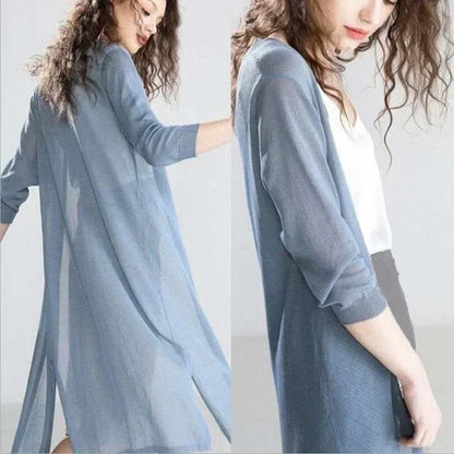 Soft, lightweight women's long cardigan. Open front, long sleeve design for comfortable, versatile layering.