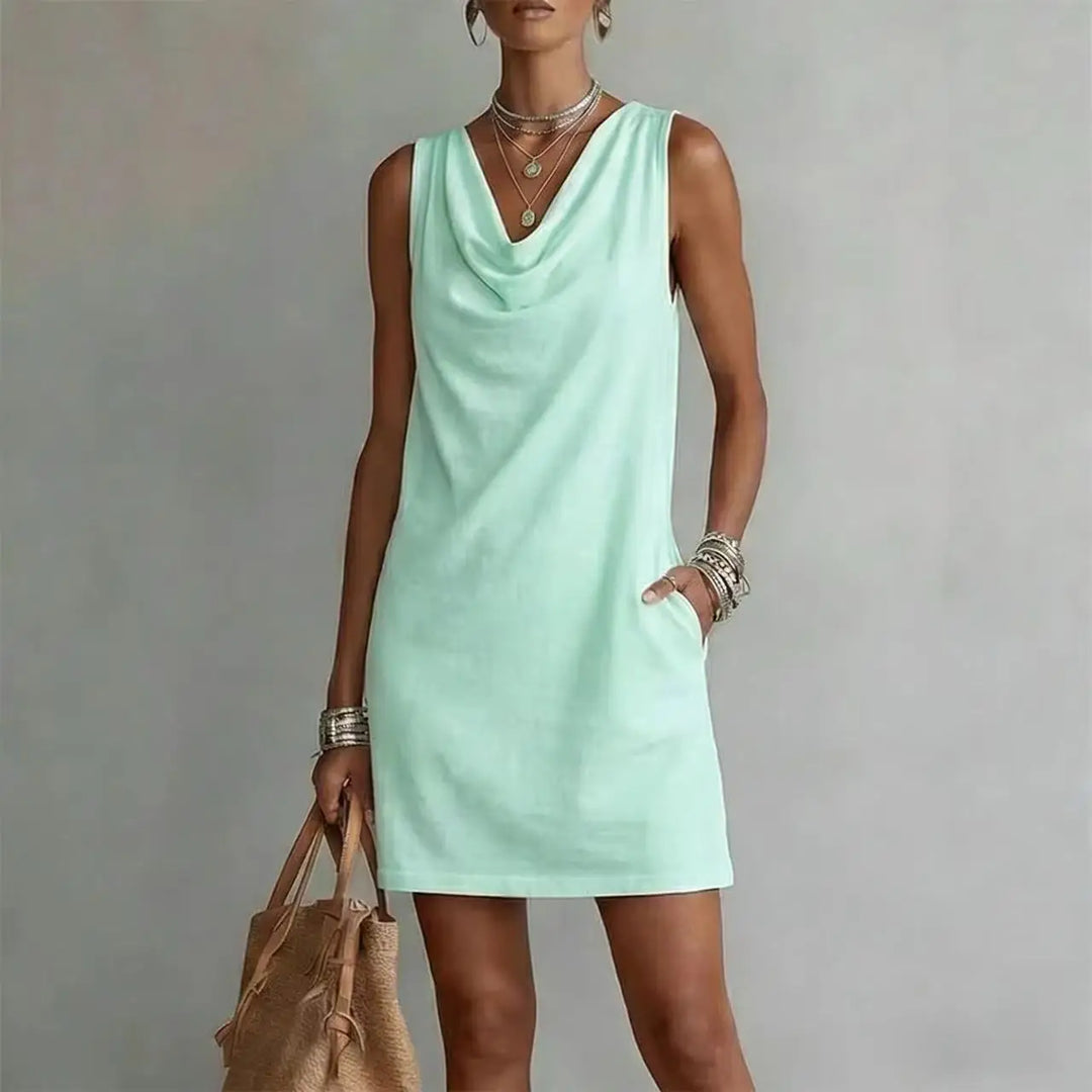 Easy-wear women's lightweight mini dress with a relaxed fit, draped neckline, perfect for warm weather casual style.