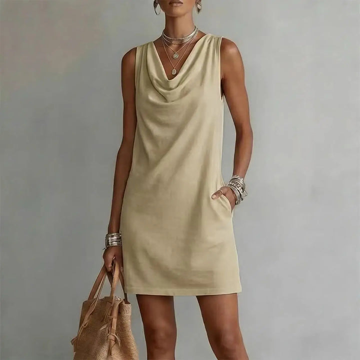 Sleeveless casual mini dress for women, lightweight, with a comfortable relaxed fit, draped neckline & pockets.