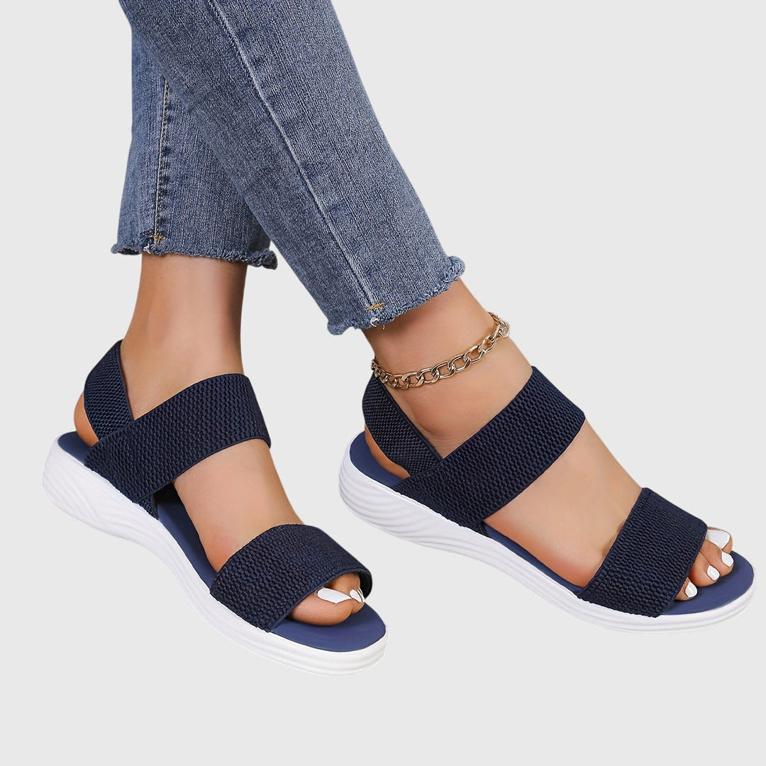 Lightweight women's comfort sandals with adjustable arch support, perfect for daily wear.