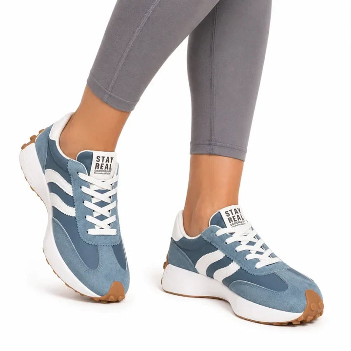 Women's casual shoes, lightweight and supportive with wide toe box for comfort.