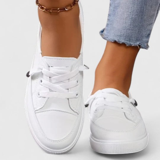 Stylish women's walking sneakers with orthopedic arch support. Lightweight & breathable for ultimate foot comfort.