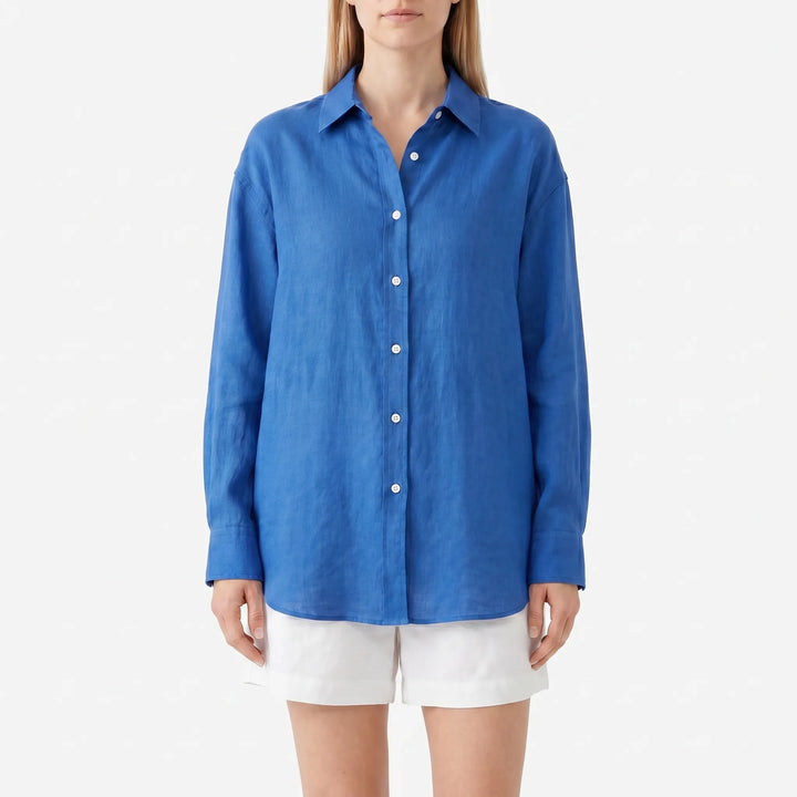 Chic women's lightweight oversized summer shirt with a turn-down collar & button front, ideal for casual style.