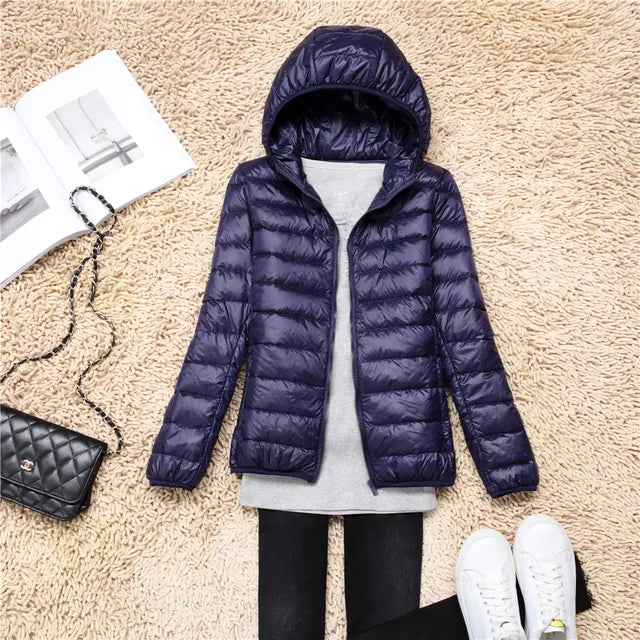 Chic women's hooded jacket, lightweight & packable. Stylish travel outerwear for her.