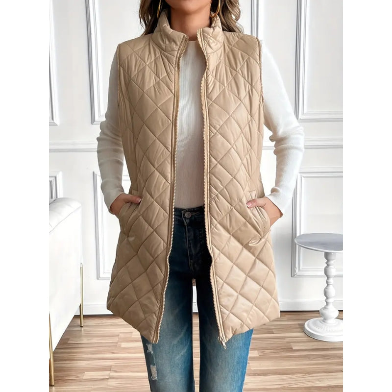Warm zip-up quilted vest for women, ideal lightweight outerwear for winter & fall.
