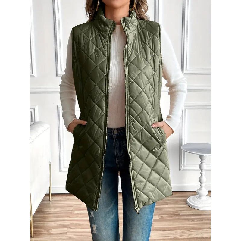 Cozy women's quilted vest, perfect for layering during cool fall & winter days.