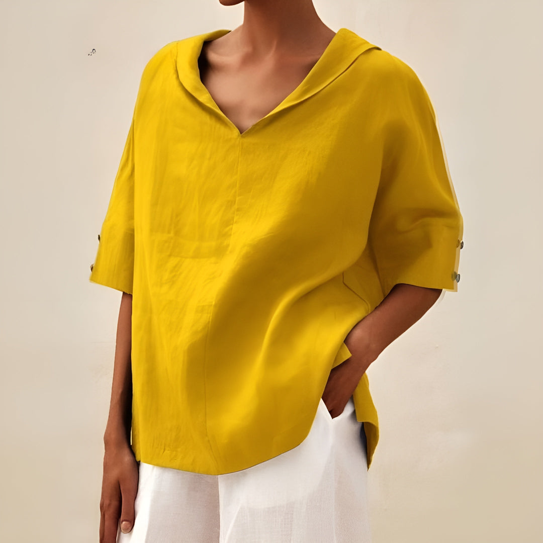 Relaxed fit women's short sleeve blouse. Versatile lightweight top for casual everyday wear. Perfect for summer fashion.