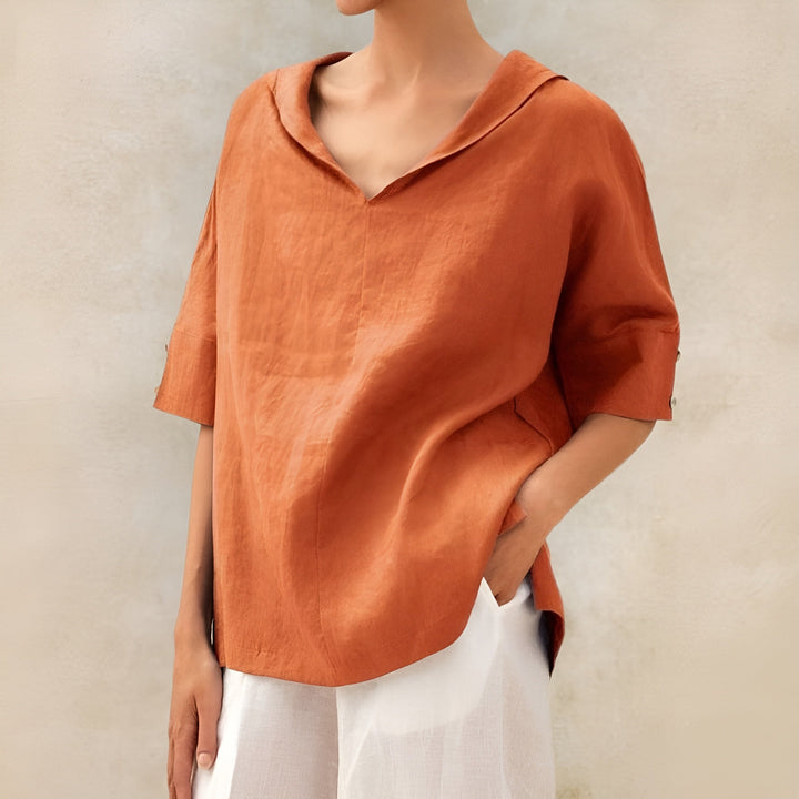 Everyday comfort with this women's lightweight short sleeve blouse. A versatile, casual summer fashion top for ladies.