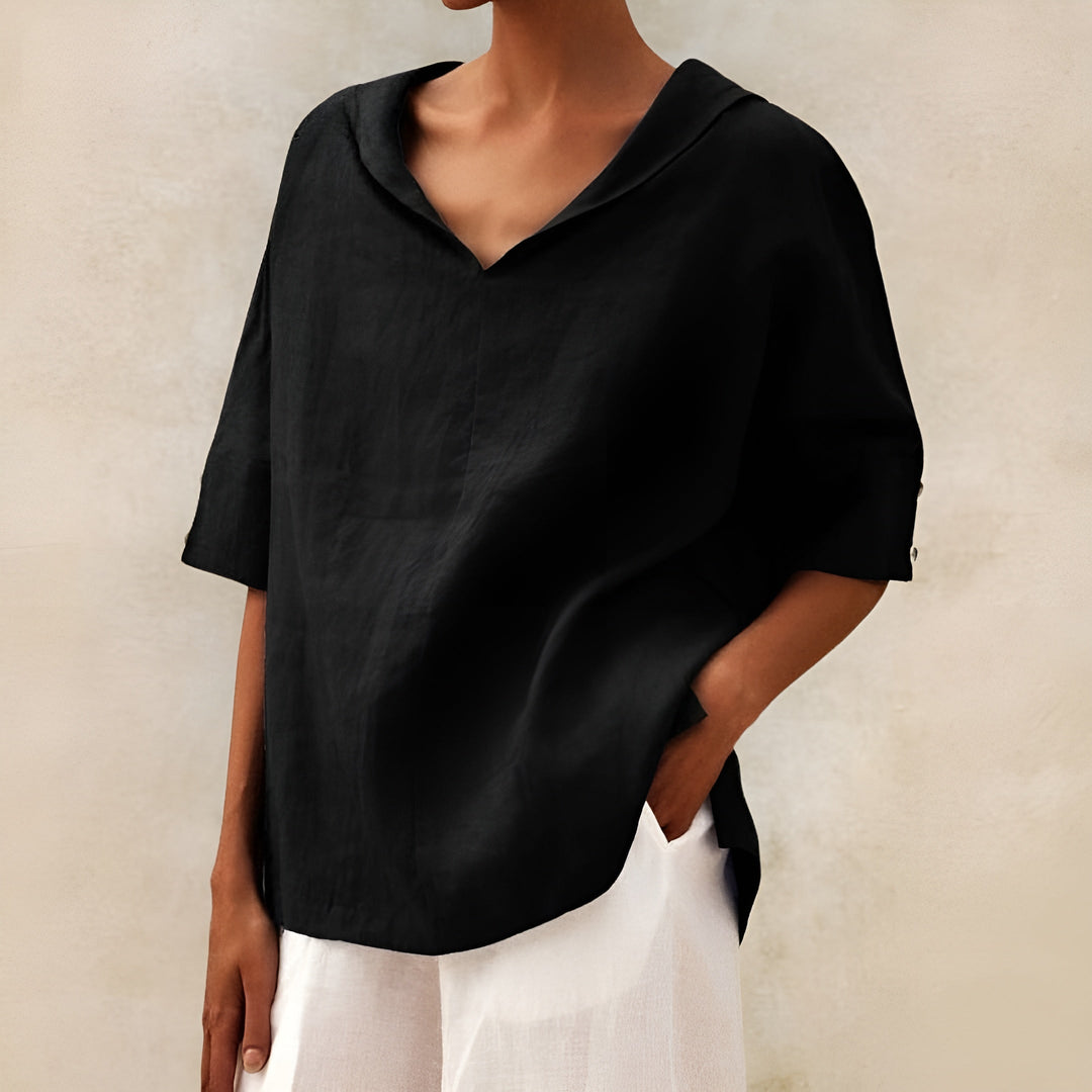 Breathable women's short sleeve blouse. Lightweight, comfortable top for summer, offering versatile everyday style. Ladies' fashion.