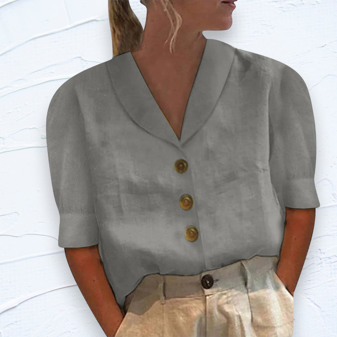 Chic women's short sleeve button-front top for versatile fashion, ideal for everyday wear or a summer look.