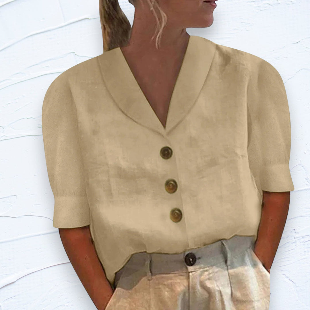 Lightweight & comfortable women's short sleeve button-front shirt, featuring a relaxed fit for summer.