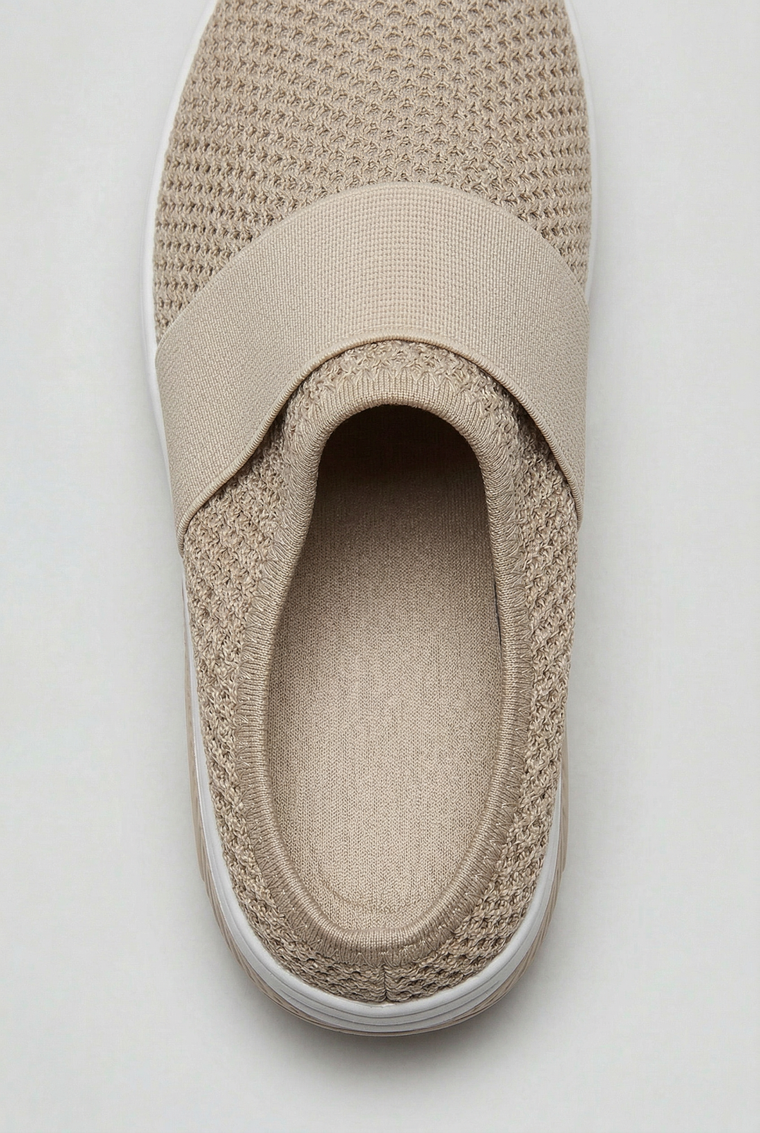 Easy wear women's slip-on mules with air cushion, offering lightweight comfort for daily style.