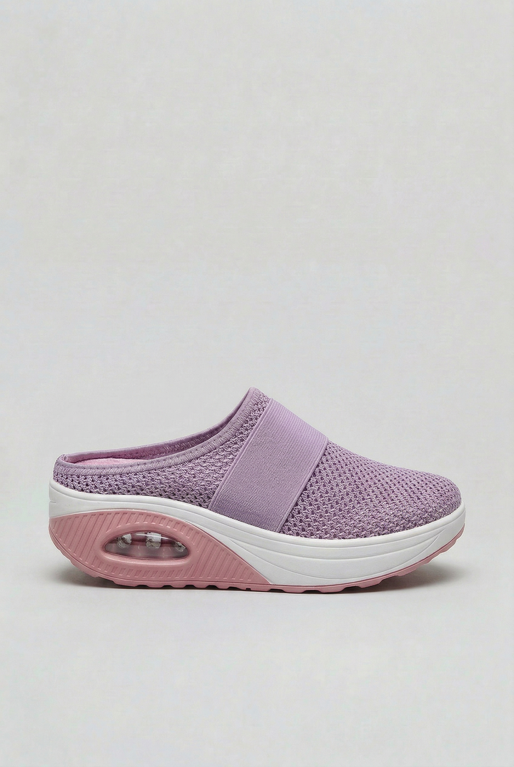 Plush air-cushion women's mules, lightweight and breathable slip-on shoes for ultimate comfort.