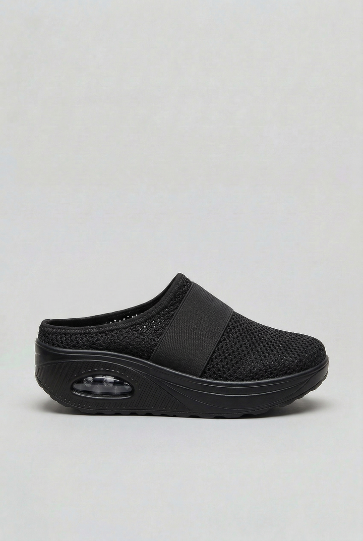 Women's breathable lightweight slip-on mules, featuring air cushion for lasting comfort.