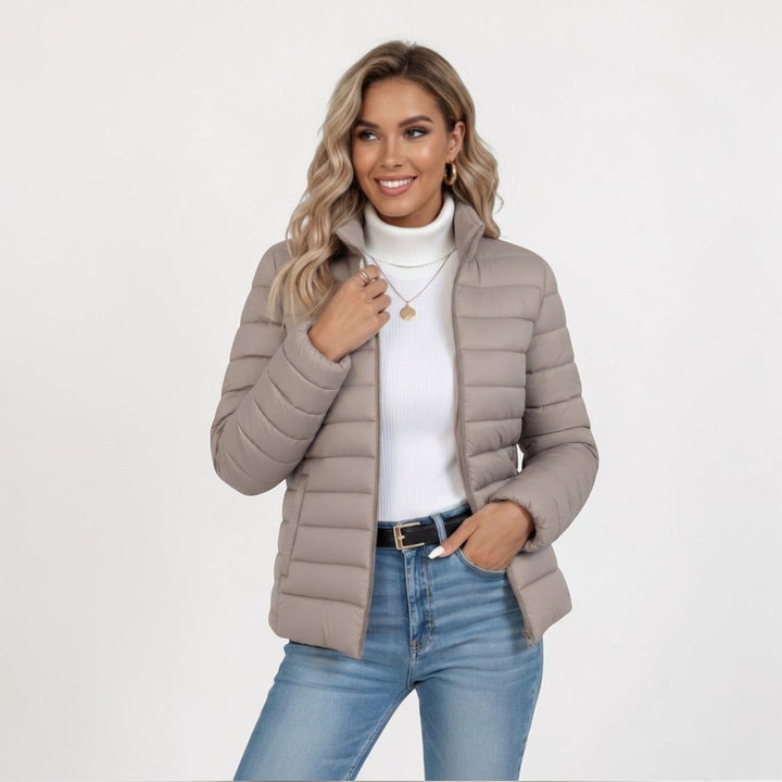 Women's lightweight stand collar zip jacket for everyday comfort and warmth.