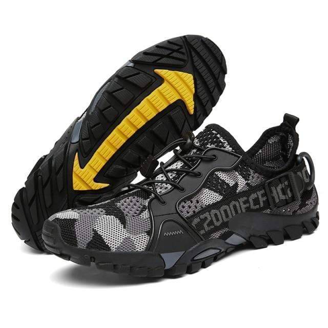 Close-up of lightweight women's summer hiking shoes, showing mesh texture, laces, and sole detailing
