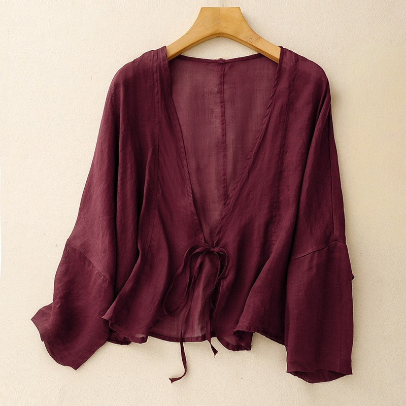 Women's lightweight tie-front cardigan, perfect for spring/summer layering, adding effortless style to any outfit.
