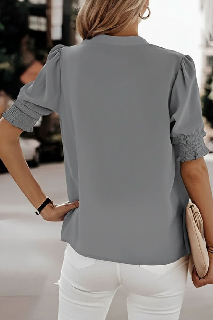 Casual chic women's lightweight V-neck blouse with puff sleeves. A breathable summer top for effortless style.