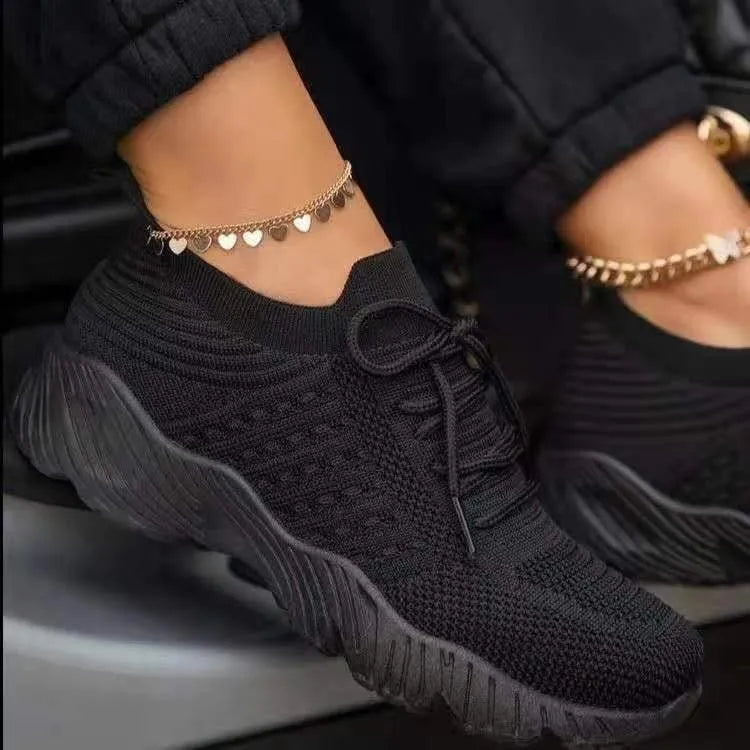 Non-slip women's athletic walking shoes, lightweight and flexible, ideal for active wear and support.