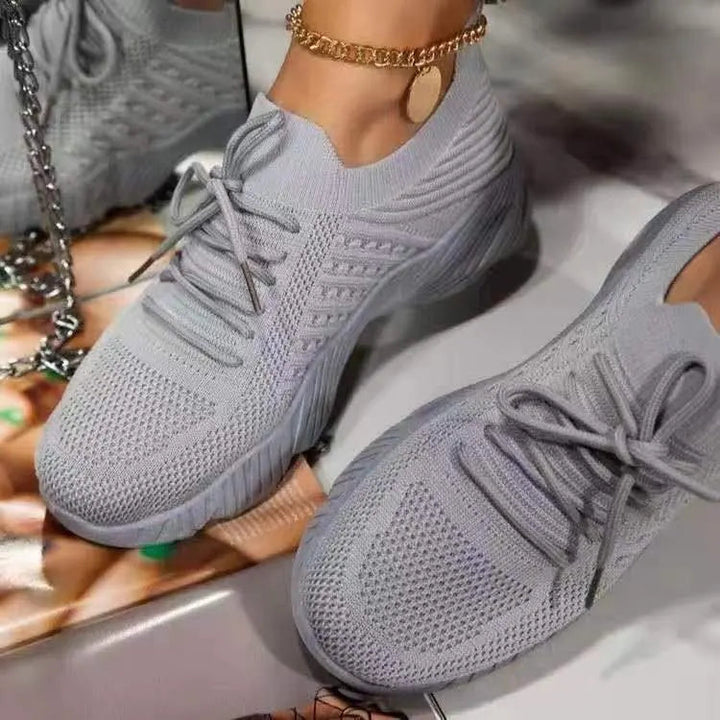 Breathable women's casual sneakers, lightweight and cushioned for comfortable, stylish everyday walking.
