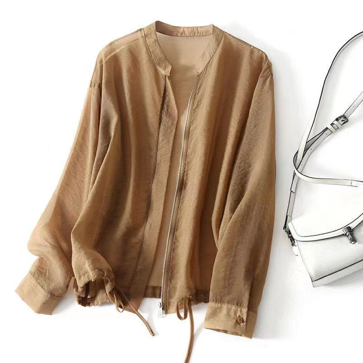 Versatile women's lightweight khaki jacket for spring & summer. Relaxed fit, adjustable, perfect casual outerwear.