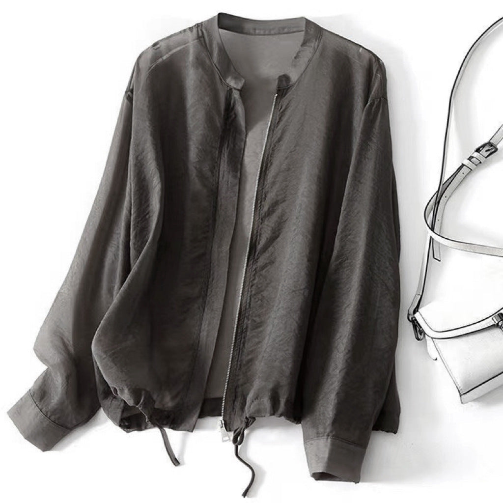 Stylish gray women's lightweight jacket, perfect for spring & summer. Adjustable, relaxed fit, versatile casual outerwear.