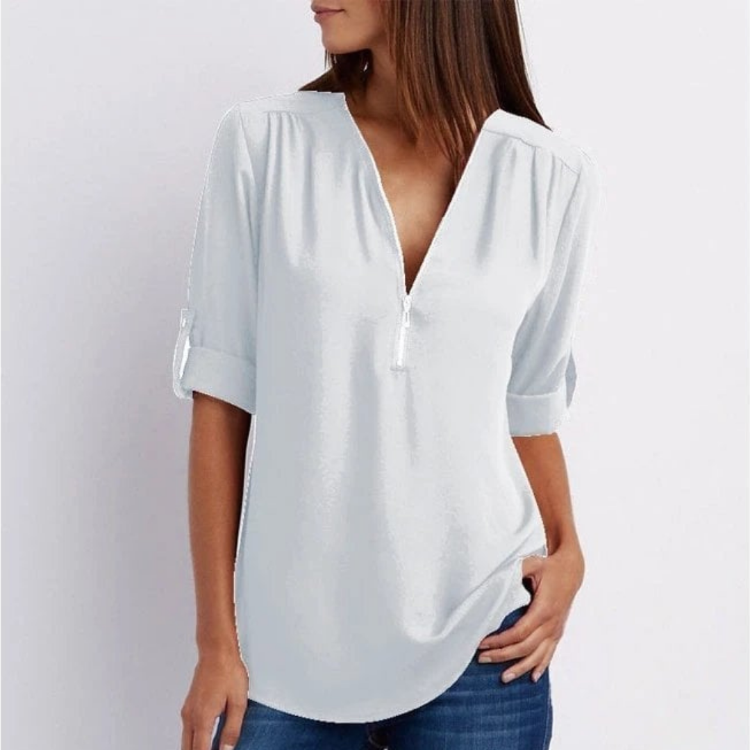 Comfortable women's V-neck blouse, zip-front closure & stylish roll-up sleeves. Ideal for everyday fashion.