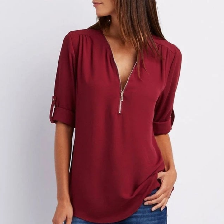 Stylish women's roll-sleeve blouse with a flattering V-neck and practical zip-front for versatile wear.