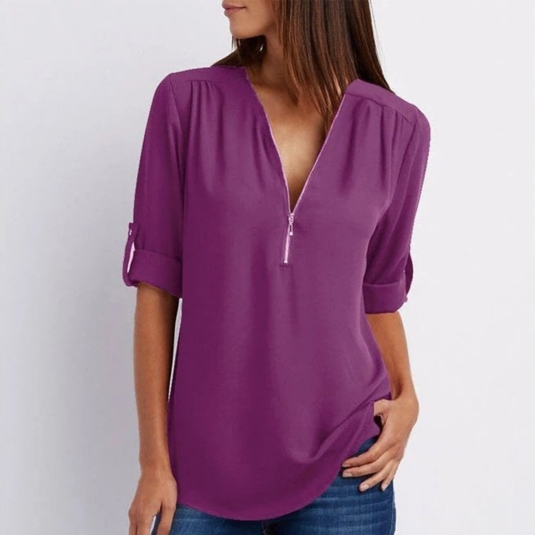 Everyday women's blouse: comfortable V-neck, zip-front, and roll-sleeves. A versatile top for any occasion.
