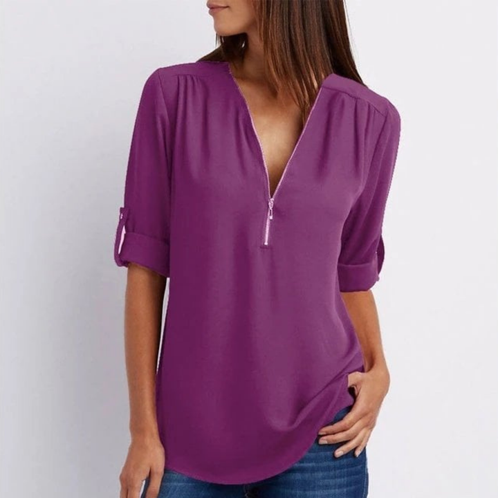 Everyday women's blouse: comfortable V-neck, zip-front, and roll-sleeves. A versatile top for any occasion.