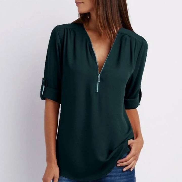 Fashionable women's zip-front V-neck blouse with roll-sleeves. A comfortable, lightweight top for work or casual.