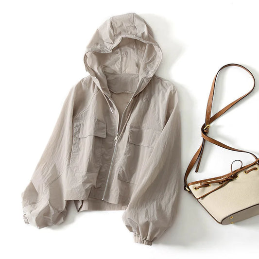 Women's lightweight zip-up hoodie, perfect for casual layering. Breathable & comfortable athleisure wear.