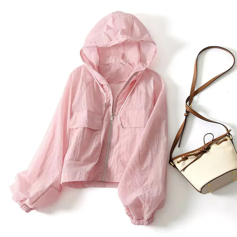 Versatile women's lightweight zip-up hoodie for spring & fall. Ideal for activewear or comfy casual layering.