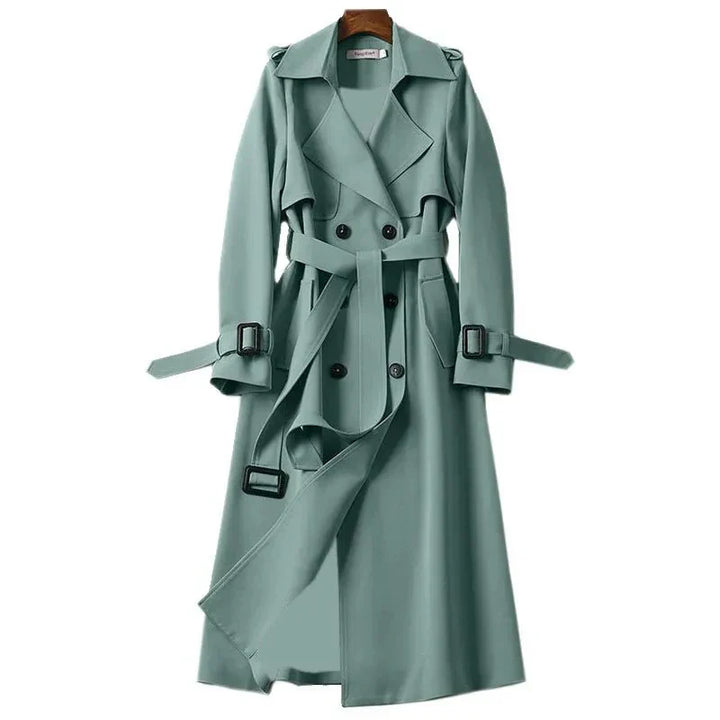 Long women's trench coat, double-breasted, tie-waist, a classic autumn jacket for chic style.