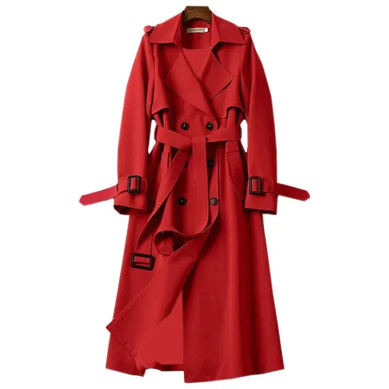 Sophisticated women's long double-breasted trench coat featuring a flattering tie belt for office wear.