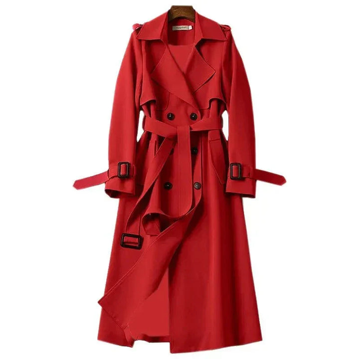 Sophisticated women's long double-breasted trench coat featuring a flattering tie belt for office wear.