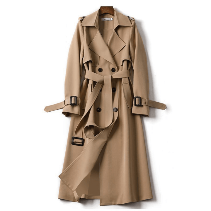 Versatile women's long double-breasted trench coat with a tie belt, essential for classic outerwear.