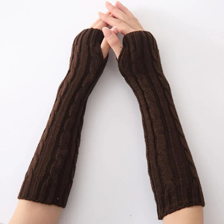 Fashionable women's long knitted fingerless gloves, a chic accessory for cold weather style.