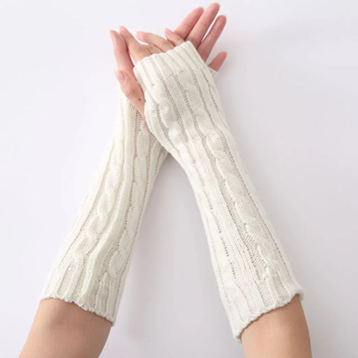 Women's FlexiWarm long fingerless knitted gloves, perfect for staying warm while active outdoors.