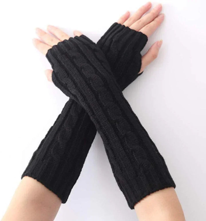 Knitted long fingerless gloves for women, offering warmth, style, and freedom for fingers.