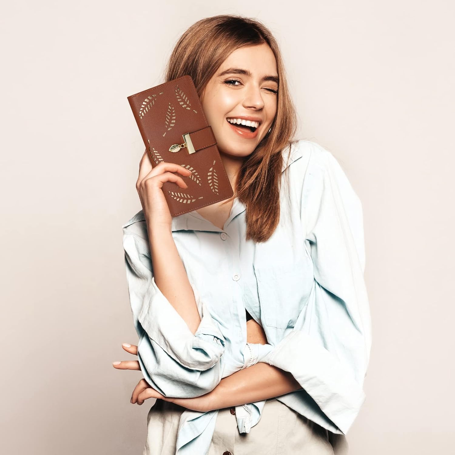 Women's slim long leather wallet, spacious yet compact. Perfect for cards & cash, a stylish accessory.